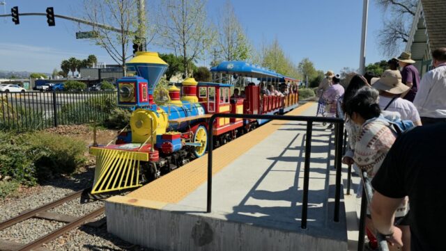 Brigthly colored children's train in a Hayward park